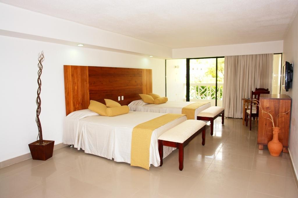 Готель Emotions By Hodelpa Puerto Plata Номер фото